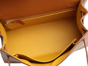 Hermès
Gold Epsom and Jaune Ambre Verso Kelly Sellier 25 Palladium Hardware, 2021