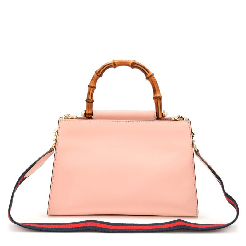 Gucci
Pink and White Calfskin Small Nymphaea Top Handle Bag Gold Hardware